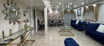 Elegant Escape: Cozy, Spacious, by JFKWEEKLY