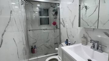 Hair dryer, bidet, towels, soap