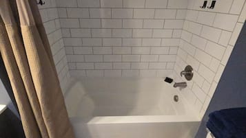 Hair dryer, towels, soap, toilet paper