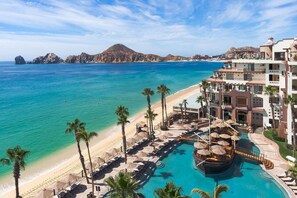 On the beach, sun-loungers, beach towels