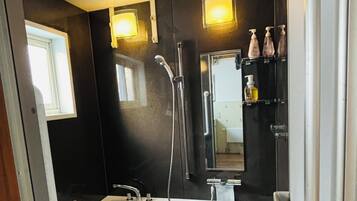 Hair dryer, bidet, towels, soap