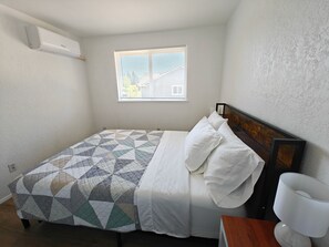 2 bedrooms, desk, iron/ironing board, travel crib