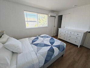 2 bedrooms, desk, iron/ironing board, travel crib
