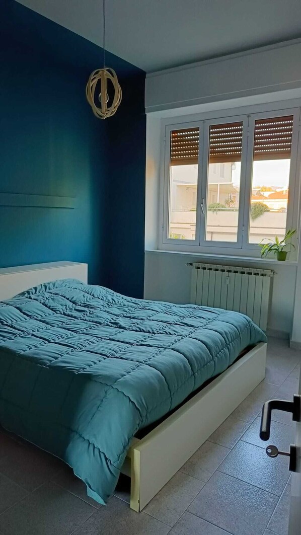 1 bedroom, desk, iron/ironing board, travel crib