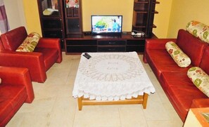 Family Room, Balcony, City View | Laptop workspace, free WiFi