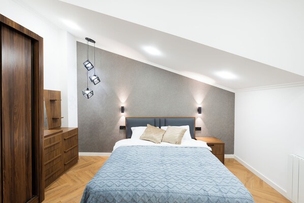 Townhome, 4 Bedrooms, Balcony | 4 bedrooms, blackout drapes, iron/ironing board, free WiFi