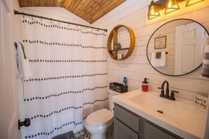 Shower, eco-friendly toiletries, hair dryer, towels