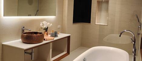 Shower, hair dryer, towels, soap