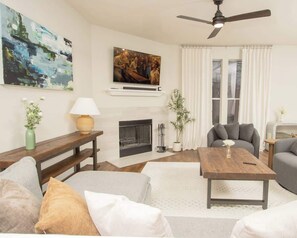 TV, fireplace, books, offices