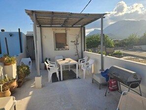 Outdoor dining - Comfortable vacation home with roof terrace in the original part of Crete (Kato Chorio)