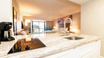 Microwave, stovetop, coffee/tea maker, cookware/dishes/utensils