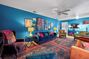 TV, fireplace, books, offices