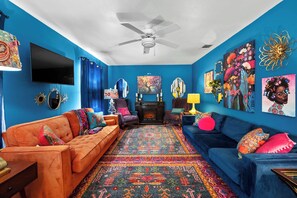 TV, fireplace, books, offices