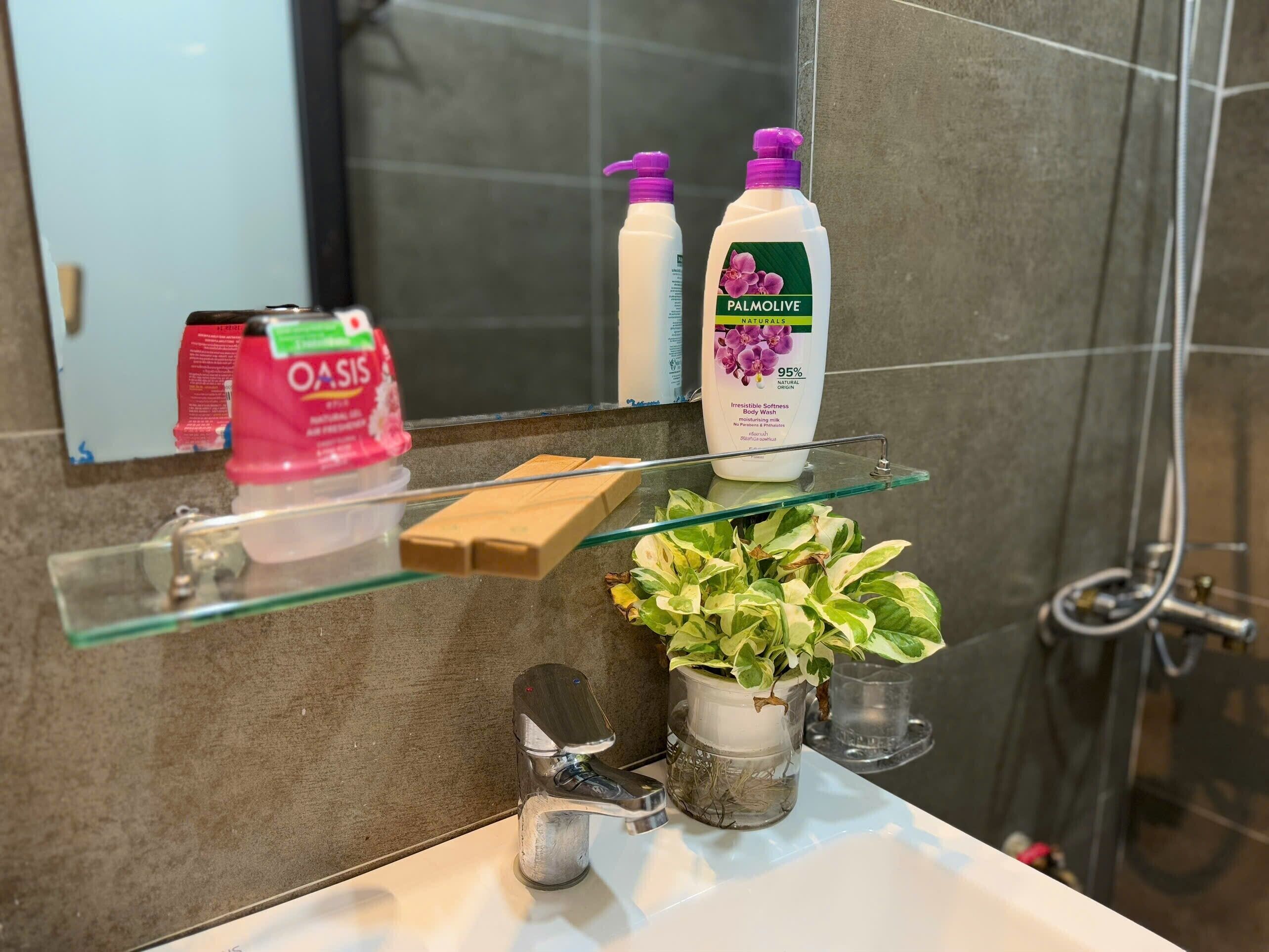 Shower, slippers, towels, soap