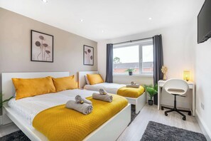 3 slaapkamers, een strijkplank/strijkijzer, wifi, beddengoed