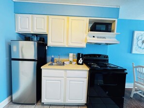 Microwave, coffee/tea maker, cookware/dishes/utensils