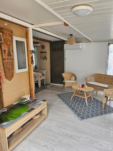 Family chalet in campsite with swimming pool