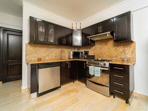 Fridge, microwave, stovetop, cookware/dishes/utensils