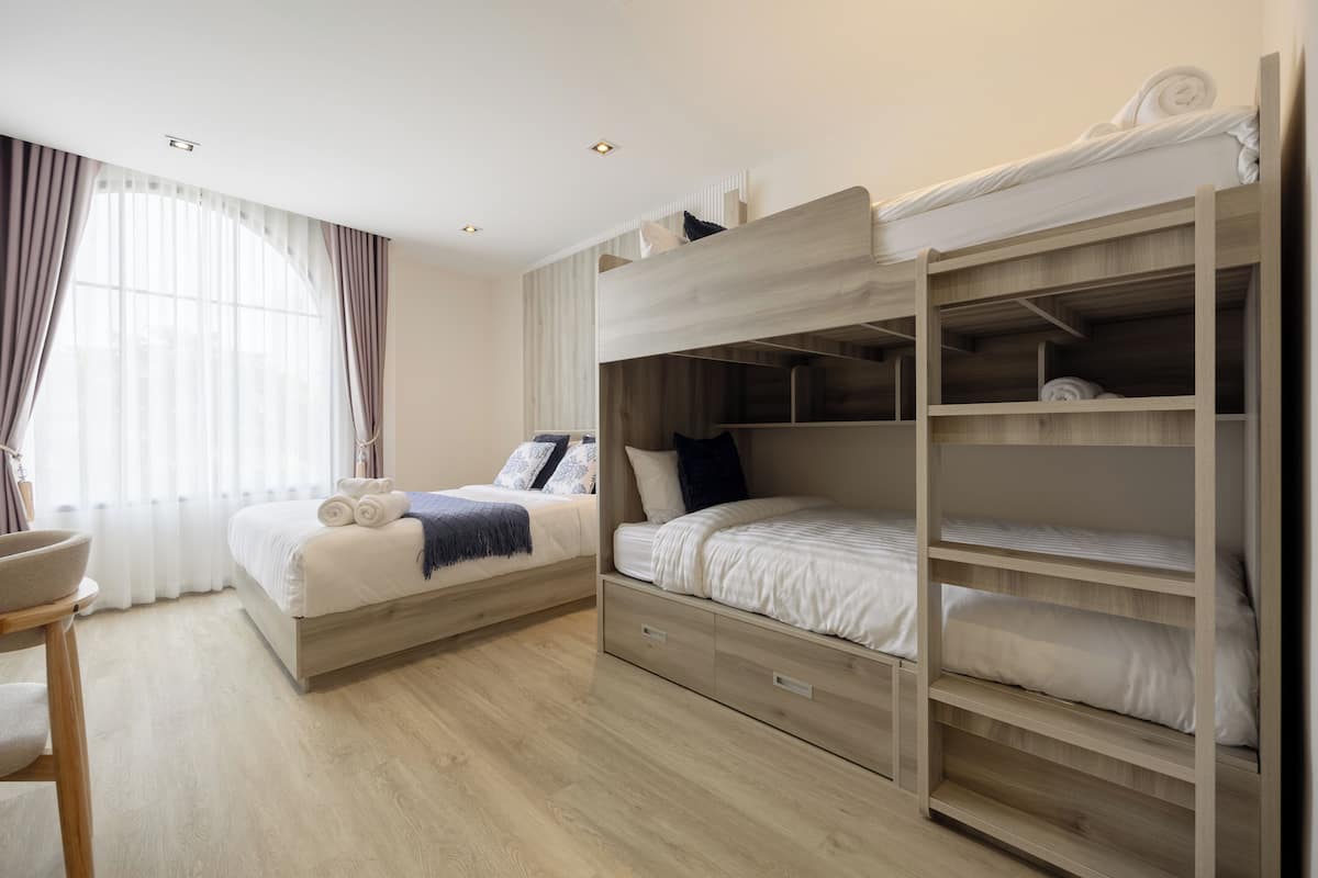 Family Quadruple Room, City View | 1 bedroom, desk, laptop workspace, free WiFi