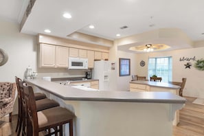 Coffee/tea maker, fridge, microwave, oven