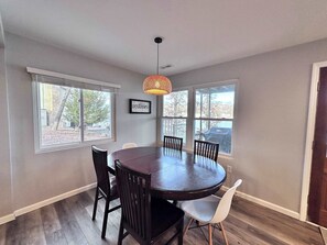 Enjoy meals in this inviting dining area with a round table and six chairs.