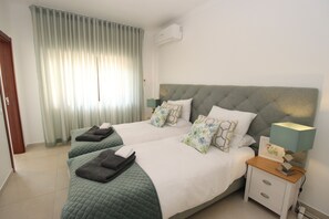 2 habitaciones, tabla de planchar con plancha, cuna de viaje y wifi 