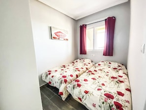 2 bedrooms, in-room safe, iron/ironing board, travel cot