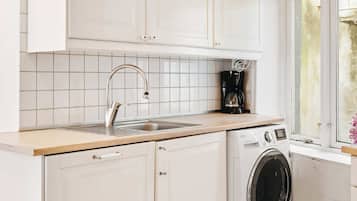 Fridge, microwave, cookware/dishes/utensils