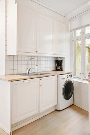 Fridge, microwave, cookware/dishes/utensils