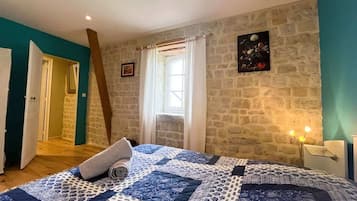 2 chambres, fer et planche Ă repasser, draps fournis