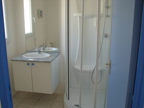 Shower, eco-friendly toiletries, toilet paper