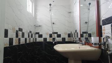 Shower, eco-friendly toiletries, hair dryer, bidet