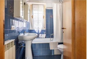 Dusj, hårføner, bidé og håndklær