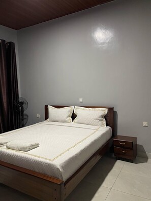 Deluxe Double Room, Balcony | In-room safe, blackout drapes, soundproofing, iron/ironing board - Rita Motel Apartment. (Kigali)