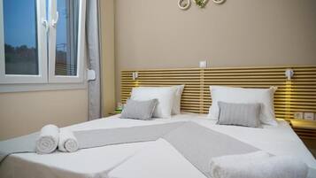 Suite, patio | 2 habitaciones, caja de seguridad en la habitación y insonorización