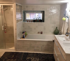 Shower, hair dryer, towels, soap