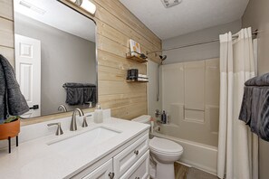 Hair dryer, towels, soap, shampoo