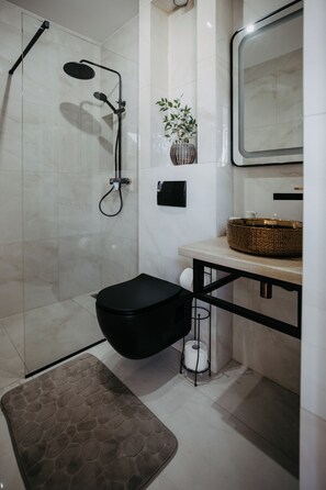 Hair dryer, towels, soap, toilet paper