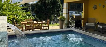 Spacious 5-bedroom house views of El Yunque and saltwater spa.