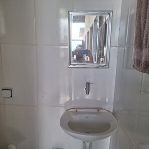 Shower, towels, soap, toilet paper