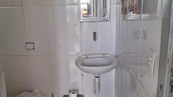 Shower, towels, soap, toilet paper