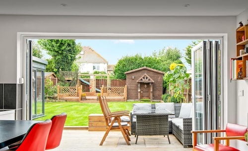 Chalet style home with large garden and beach hut within 2 minute walk