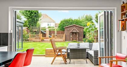 Chalet style home with large garden and beach hut within 2 minute walk