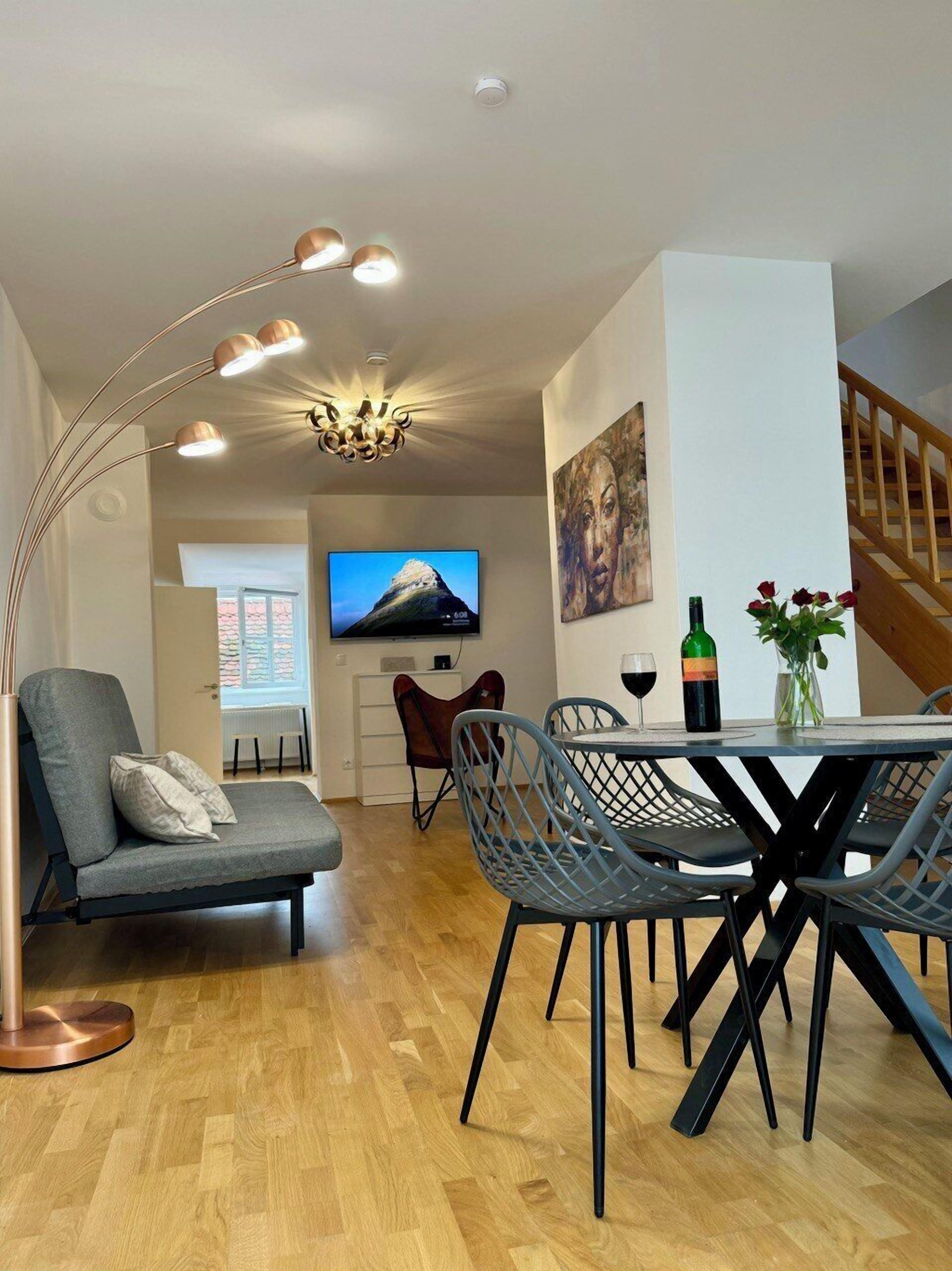 Deluxe Duplex, City View | Living area | 46-inch flat-screen TV with cable channels, TV