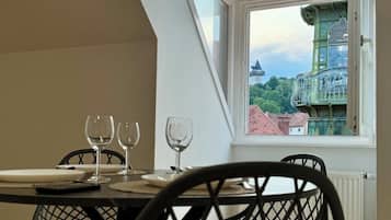Deluxe Duplex, City View | In-room dining