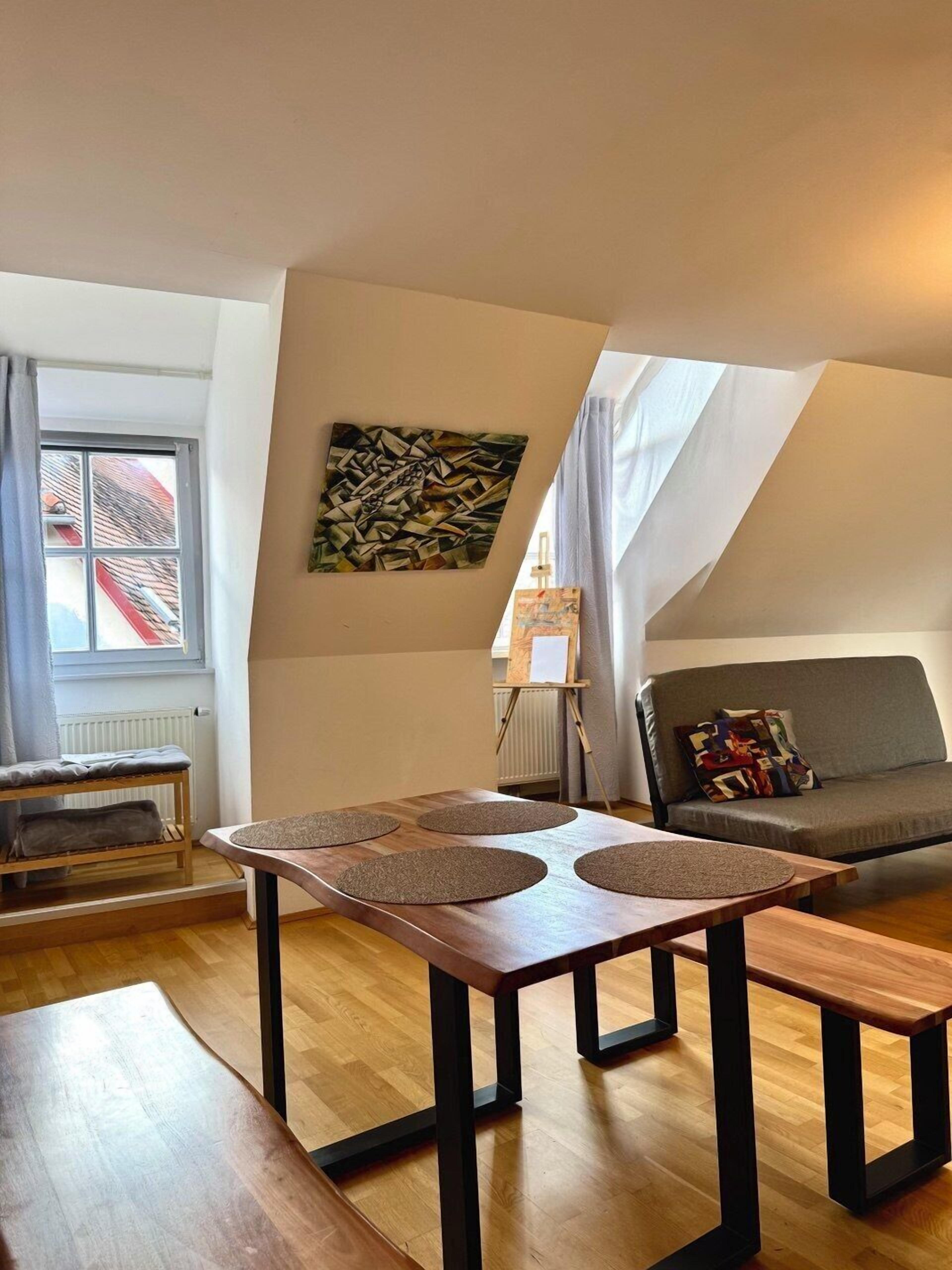 Desk, laptop workspace, blackout drapes, iron/ironing board