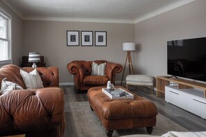 Smart TV, fireplace, books