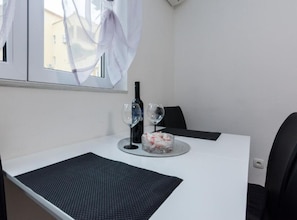 Apartment (Classic One Bedroom Apartment with Ba) | Living room | 32-inch flat-screen TV with satellite channels