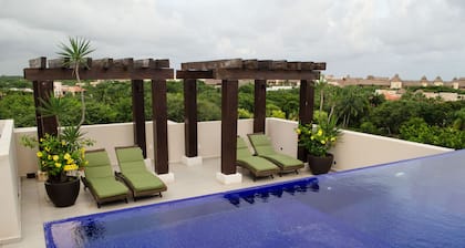 Charming 2-bedroom condo with WiFi, AC in wonderful Puerto Aventuras