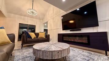 Smart TV, fireplace, foosball, stereo